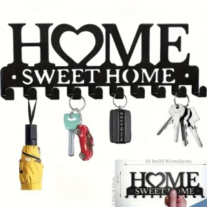 Ключодържател за стена с надпис "Home Sweet Home", черен метал, с кукички за ключове, чадъри и други предмети. Декоративен и практичен аксесоар за дома.